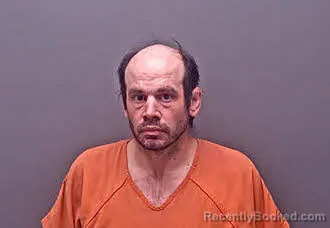 Mugshot of DENNIS JAMES SCHOONOVER