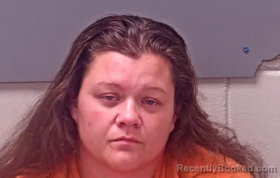 Mugshot of Courtney Elise Cooper-Minchew booked in Baldwin County, Alabama on October 17, 2026