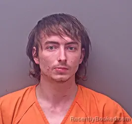 Mugshot of DEVIN MATHEW WOLCHINA booked in Baldwin County, Alabama on March 4, 2026