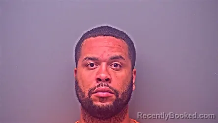 Mugshot of DANDRE MARCEL RILEY booked in Baldwin County, Alabama on April 6, 2026