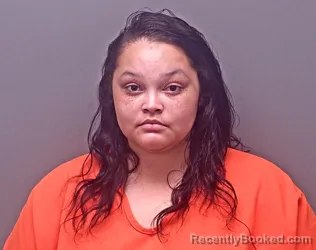 Mugshot of Mia Shari Riley booked in Baldwin County, Alabama on October 21, 2026