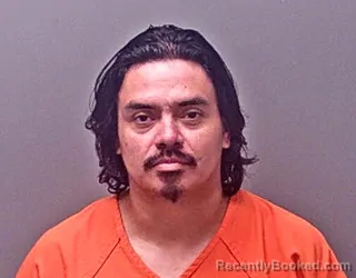 Mugshot of BYRON OSWALDO MOLINA booked in Baldwin County, Alabama on June 21, 2026