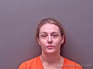 Mugshot of BRITTANY ALEXANDRA ENFINGER booked in Baldwin County, Alabama on June 28, 2026