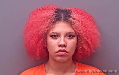 Mugshot of Emma Raine Coggin booked in Baldwin County, Alabama on October 8, 2026