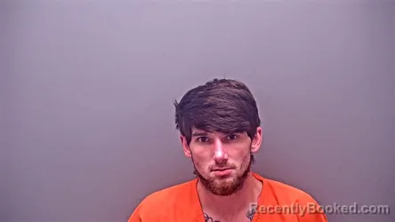 Mugshot of TUCKER AUSTIN THOMAS booked in Baldwin County, Alabama on May 4, 2026