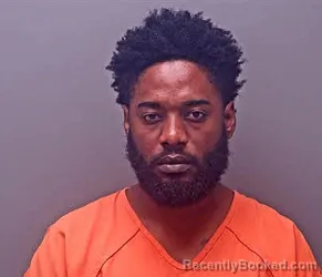 Mugshot of MALIK NICHOLAS REID booked in Baldwin County, Alabama on March 10, 2026