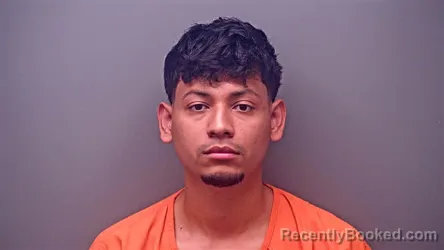 Mugshot of ACHINE HEISENVERG BUSTILLO-PALMA booked in Baldwin County, Alabama on March 19, 2026