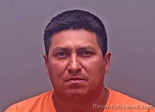 Mugshot of Orlen Padilla-Flores booked in Baldwin County, Alabama on March 21, 2026