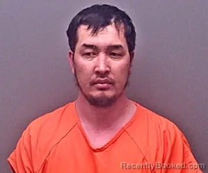 Mugshot of RUSLANBEK ASALATOV booked in Baldwin County, Alabama on March 23, 2026