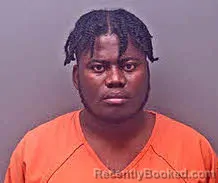 Mugshot of CADINORD ISIDOR booked in Baldwin County, Alabama on March 24, 2026