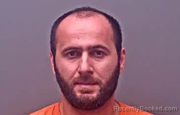 Mugshot of HUSAIN GHAFFOROV booked in Baldwin County, Alabama on March 26, 2026