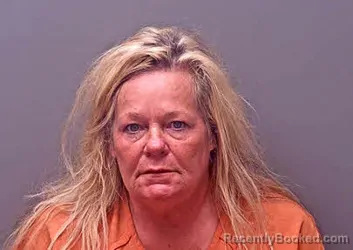 Mugshot of KATHY ANN IGO booked in Baldwin County, Alabama on March 31, 2026