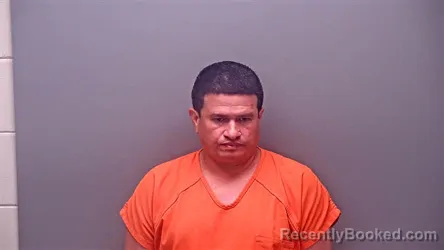 Mugshot of ADELSO ESPANA BARBUDO booked in Baldwin County, Alabama on May 4, 2026