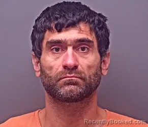 Mugshot of RAMAZAN MUSLIMOV booked in Baldwin County, Alabama on June 20, 2026