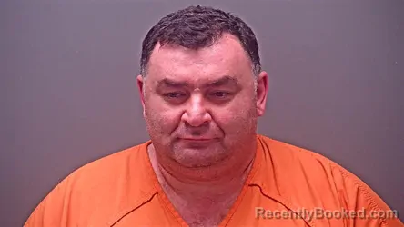 Mugshot of GIORGI KHVTISIAHVILI booked in Baldwin County, Alabama on June 23, 2026