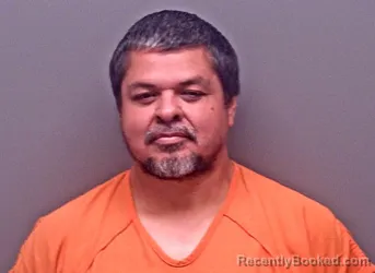 Mugshot of JUAN GABRIEL FLORES-PATINO booked in Baldwin County, Alabama on July 13, 2026