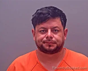 Mugshot of Gustavo Abel Flores-Cruz booked in Baldwin County, Alabama on August 11, 2026