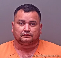 Mugshot of Erik Quinonez-Turcios booked in Baldwin County, Alabama on August 27, 2026