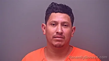 Mugshot of Juan Alberto Garcia-Mejia booked in Baldwin County, Alabama on August 28, 2026