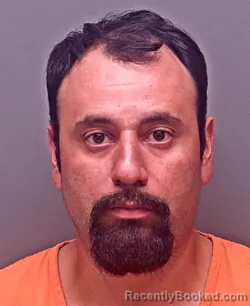 Mugshot of Julio Ernesto Martinez-Cambron booked in Baldwin County, Alabama on September 27, 2026