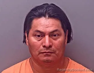 Mugshot of Enrri Munguia-Hernandez booked in Baldwin County, Alabama on October 7, 2026
