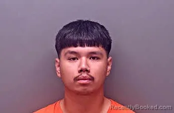 Mugshot of Blair Haiyang Sandoval booked in Baldwin County, Alabama on October 12, 2026