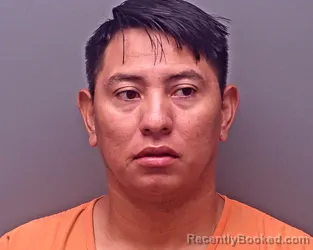 Mugshot of Denis Omar Flores-Espinoza booked in Baldwin County, Alabama on October 16, 2026