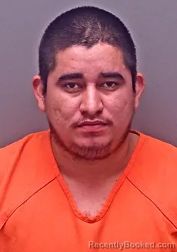 Mugshot of Carlos Augusto Ramirez-Fernandez booked in Baldwin County, Alabama on October 18, 2026