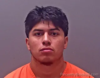 Mugshot of Junior Alexander Flores booked in Baldwin County, Alabama on October 19, 2026