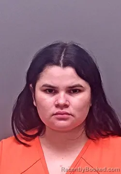 Mugshot of Denia Isabel Leon-Reyes booked in Baldwin County, Alabama on October 21, 2026
