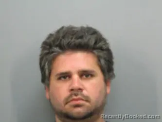 Mugshot of Brooks Luis Lugo booked in Baldwin County, Alabama on August 10, 2026