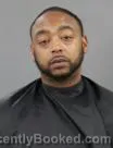 Mugshot of CORSHAUN MIDRIKUS MARTIN