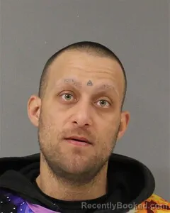 Mugshot of JUSTIN BECK