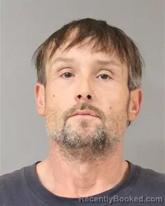 Mugshot of JUSTIN PURSER
