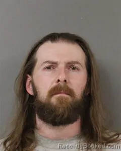 Mugshot of JUSTIN MCCOMBS booked in Blount County, Alabama on March 26, 2026