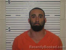 Mugshot of JONATHON MYKEL MINIARD