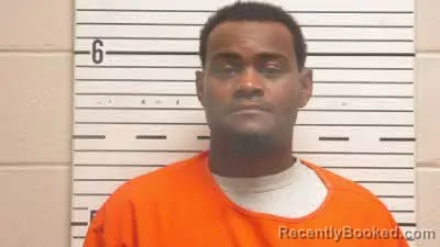 Mugshot of DINARVES ATRON SMITH