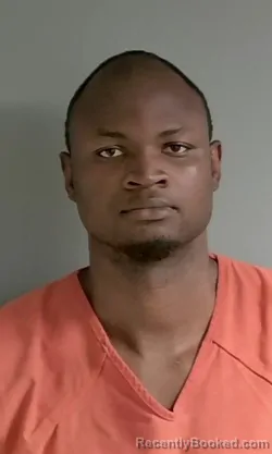 Mugshot of Daniel Adegboyega booked in Calhoun County, Alabama on July 29, 2026