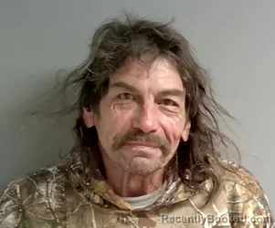 Booking photo from Calhoun County, Alabama