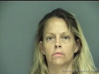 Mugshot of Gretchen Crowe booked in Calhoun County, Alabama on August 4, 2026
