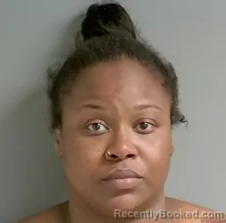 Mugshot of Kenisha Cosper booked in Calhoun County, Alabama on August 9, 2026