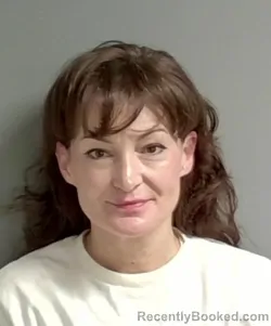 Mugshot of Natalie Dumitras Barker booked in Calhoun County, Alabama on September 11, 2026