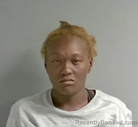 Mugshot of Ebony Garrett booked in Calhoun County, Alabama on September 30, 2026