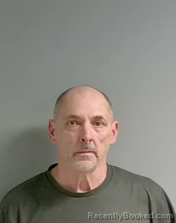 Mugshot of John Grega booked in Calhoun County, Alabama on May 12, 2026