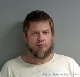 Booking photo from Calhoun County, Alabama