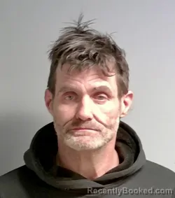 Mugshot of Derek Johns