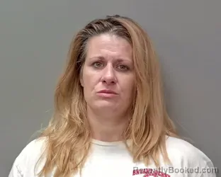 Mugshot of Whitney Kirby booked in Calhoun County, Alabama on April 10, 2026