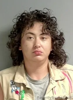 Mugshot of Abigail Leon Mora booked in Calhoun County, Alabama on September 13, 2026