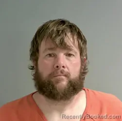 Booking photo from Calhoun County, Alabama