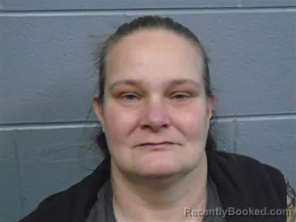 Mugshot of Anita Miller booked in Calhoun County, Alabama on August 6, 2026